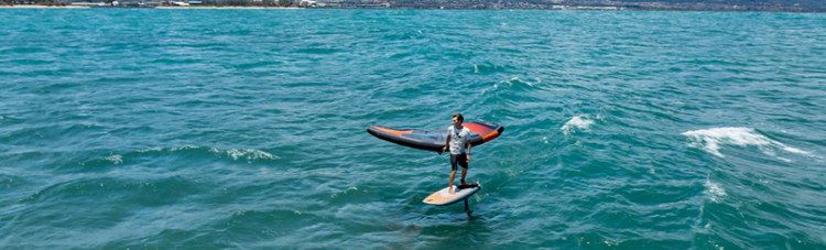 Green Hat Kiteboarding-Cabrinha Crosswing X3-Winger Riding Some Swell on Cabrinha Wing Foiling Gear