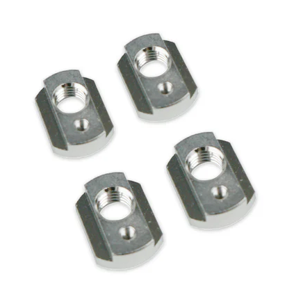 Load image into Gallery viewer, Four small metallic silver t-nuts with threaded holes, arranged in a 2x2 grid on a plain white background.
