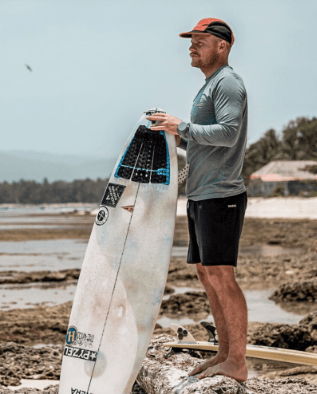 Load image into Gallery viewer, Green Hat Kiteboarding-2025 Manera Haapiti Shorts-Black-Action Shot
