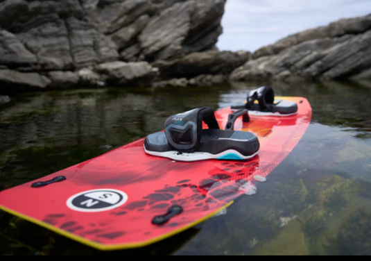 Green Hat Kiteboarding-2025 North Prime TwinTip-Live Shot-Prime TT Board Sitting in a Puddle of Water