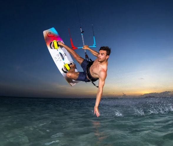 Load image into Gallery viewer, Green Hat Kiteboarding-2026 Duotone Select Concept Blue Kiteboard-Action Shot-Man Kiteboarding on a Select Concept Blue twintip
