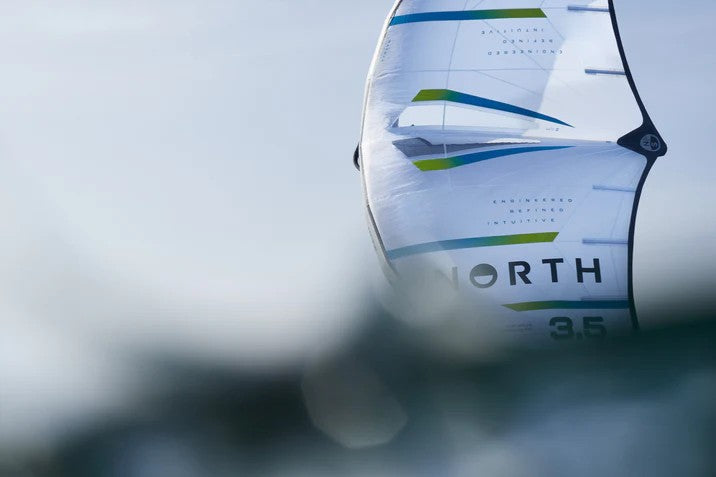 Load image into Gallery viewer, Green Hat Kiteboarding-2026 North Mode Pro Wing-Live Shot-Close-up of the North Mode Pro on a blurred foreground
