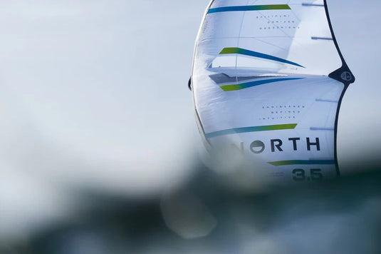 Green Hat Kiteboarding-2026 North Mode Pro Wing-Live Shot-Close-up of the North Mode Pro on a blurred foreground