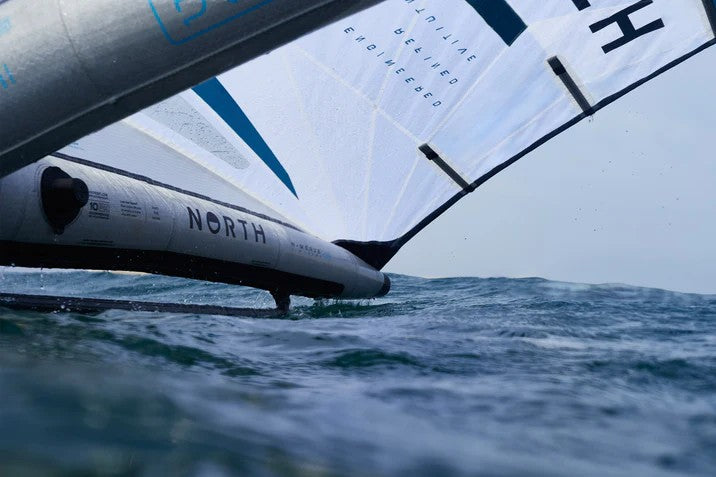 Load image into Gallery viewer, Green Hat Kiteboarding-2026 North Mode Pro Wing-Live Shot-Close-up of the Center Strut of the North Mode Pro on Water

