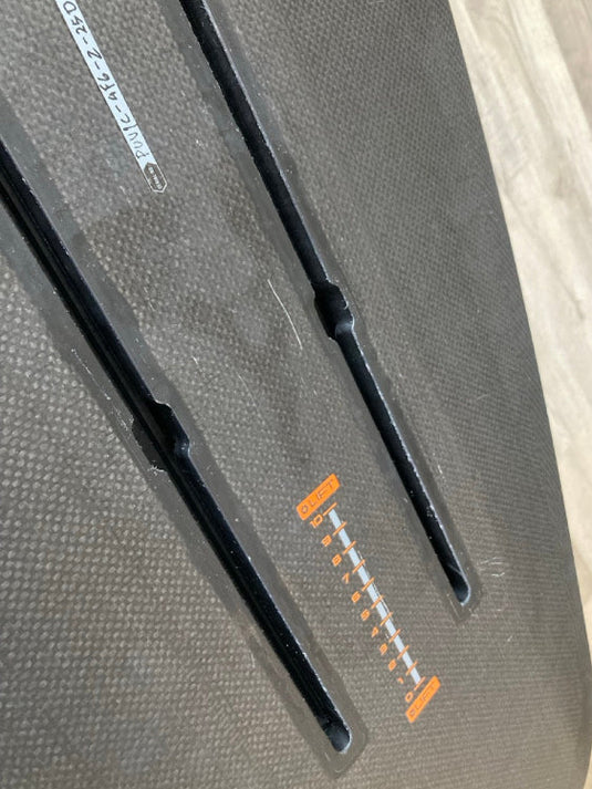 Green Hat Kiteboarding-4'6 Ozone Pulse V1 Carbon Foilboard USED-Close Up View of Foil Track on a Wooden Background