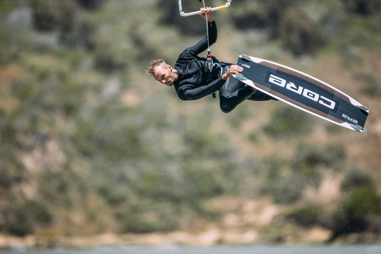 Green Hat Kiteboarding-Core ERA Twin  Tip-Action Shot-Man kiteboarding on Core ERA Twin Tip