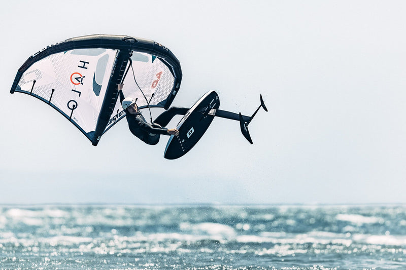 Load image into Gallery viewer, Green Hat Kiteboarding-Core Halo Wing-Action Shot-Man in the Air on a Core Halo Wing
