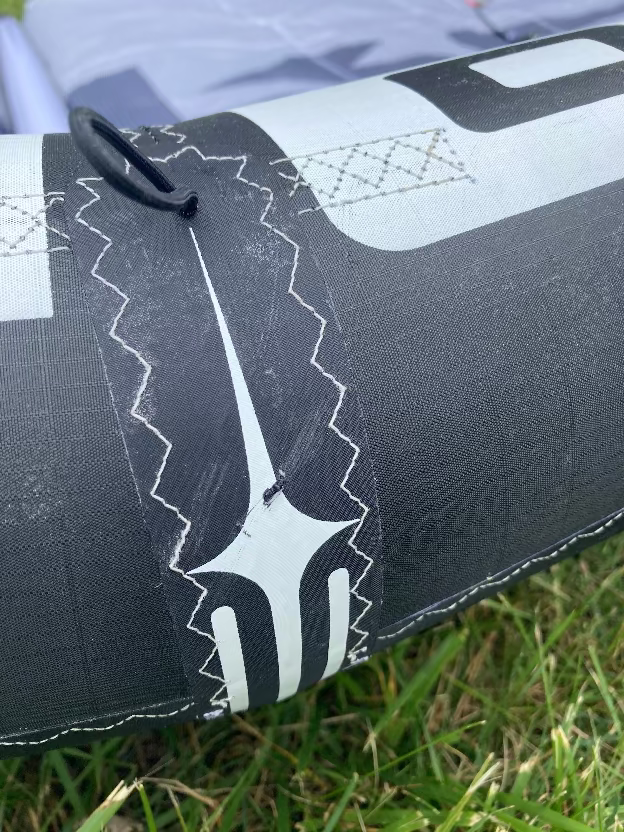 Load image into Gallery viewer, Green Hat Kiteboarding-Core Nexus 4 7m Kite USED-Close Up View of Leading Edge Scuff
