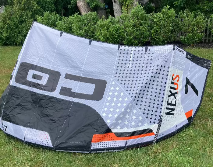 Load image into Gallery viewer, Green Hat Kiteboarding-Core Nexus 4 7m Kite USED-Right Wing Tip View on Grass
