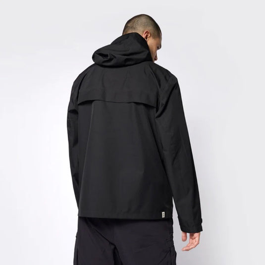 Green Hat Kiteboarding-Mystic DTS Rain Jacket-Black-Back View-Worn by a Man