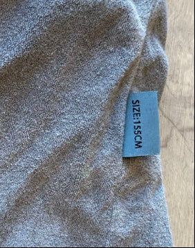 Load image into Gallery viewer, Green Hat Kiteboarding-Dakine 155cm Wing Board Sock USED-Close Up View of Size Tag
