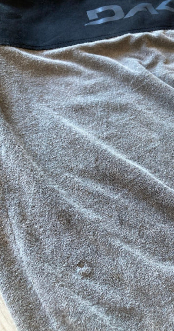 Green Hat Kiteboarding-Dakine 155cm Wing Board Sock USED-Close Up View of Hole