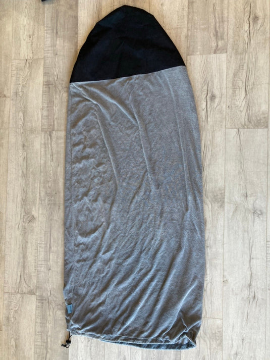 Green Hat Kiteboarding-Dakine 155cm Wing Board Sock USED-Bottom View on a Wooden Surface