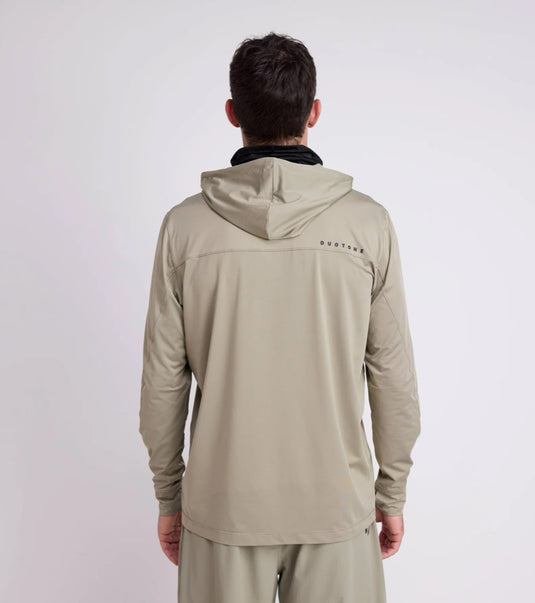 Person wearing a dusty forrest Duotone Longsleeve Wetshirt Guard men with a Duotone brand logo on the back against a white background