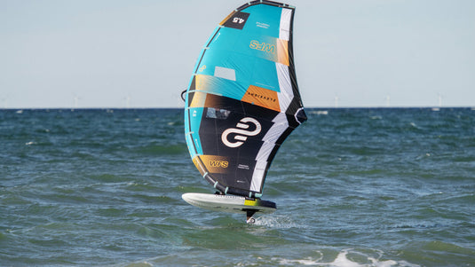 Green Hat Kiteboarding-Eleveight WFS V6-Action Shot-Man Wing Foiling on Eleveight Gear