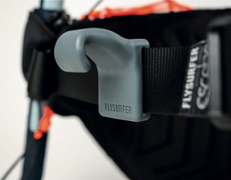 Load image into Gallery viewer, Close-up of a Flysurfer Escape harness with a gray hook on a white background
