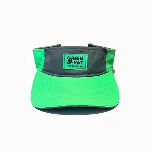 Green Hat Kiteboarding Powered By Vaikobi Performance Visor on a white background.