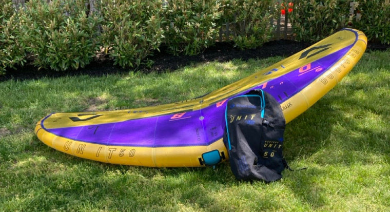 Load image into Gallery viewer, Green Hat Kiteboarding-2024 Duotone Unit D/LAB 5m Wing USED-Front Leading Edge View with Bag
