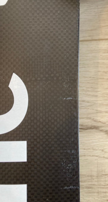 Load image into Gallery viewer, Green Hat Kiteboarding-F-One 80cm Carbon Mast USED-Close Up of Blemishes &amp; Imperfections Trailing Edge
