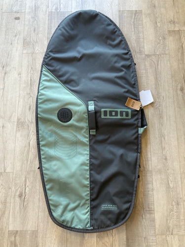 Green Hat Kiteboarding- ION Wing Board Bag 4'9 USED-Top View on a Wooden Surface
