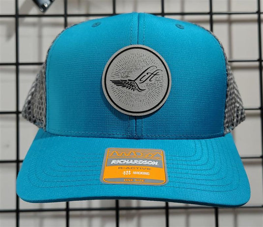 Green Hat Kiteboarding-Lift Foils R-Active Cap-Blue-Front View of  cap featuring 'Lift' branding on a grid background