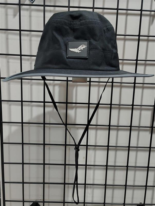 Green Hat Kiteboarding-Lift Foils Bucket Hat-Front View of Black bucket hat with a logo patch on a grid background