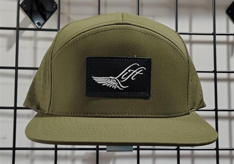 Load image into Gallery viewer, Green Hat Kiteboarding-Lift Foils Water Cap-Front View of Green cap with a black patch featuring &#39;Lift&#39; branding on a grid background
