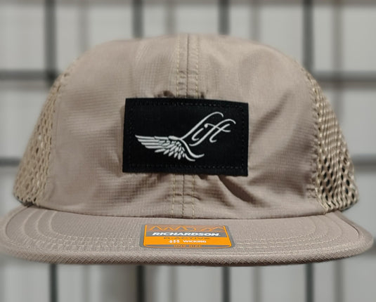 Green Hat Kiteboarding-Lift Foils R-Active Cap-Sand-Front View of  cap  on a grid background