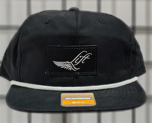Green Hat Kiteboarding-Lift Foils R-Active Cap-Black-Front View of  cap  on a grid background