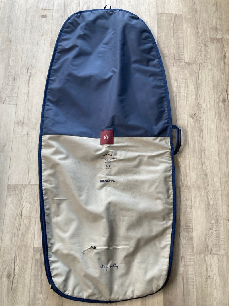 Load image into Gallery viewer, Green Hat Kiteboarding-Manera5&#39;7 Wing Board Bag-USED-Top View on a Wooden Surface
