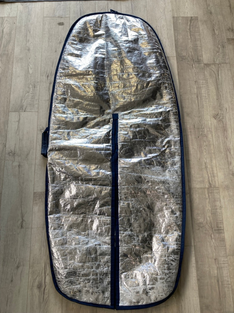 Load image into Gallery viewer, Green Hat Kiteboarding-Manera5&#39;7 Wing Board Bag-USED-Bottom View on a Wooden Surface
