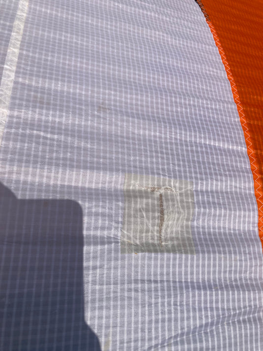 Small repair on top side of canopy.