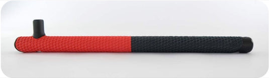 A textured cylindrical monobloc handlebar shown in a side profile view, featuring a red left half and a black right half, with a small black vertical tab on the left side, set against a light gray background.