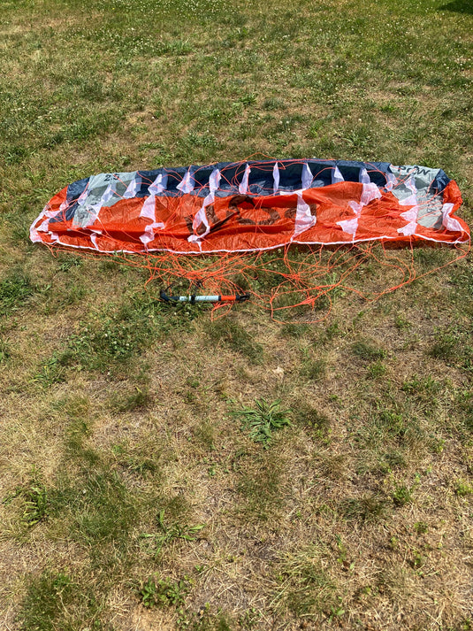 Rear bottom side view of para wing, bar, and lines. 