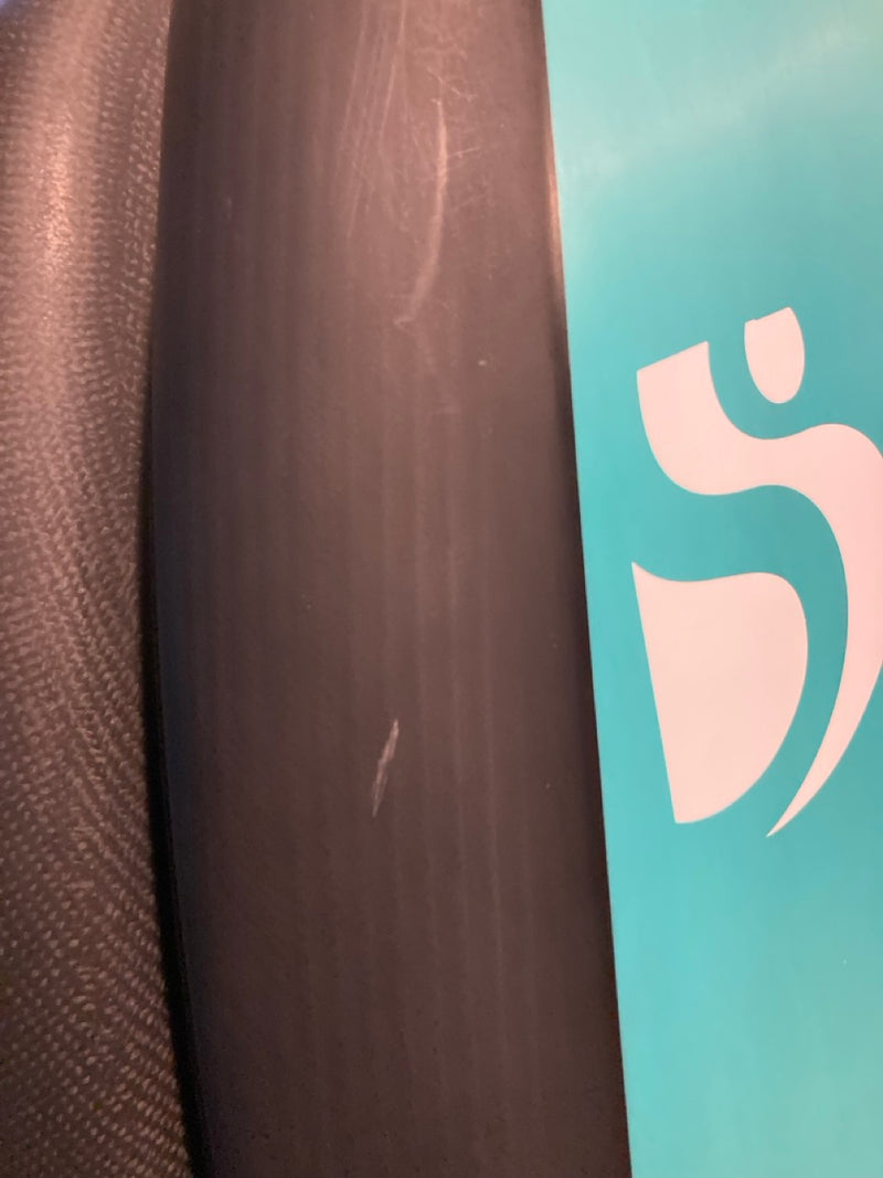 Load image into Gallery viewer, Green Hat Kiteboarding-Sunova X 4&#39;8 Foil Drive Foilboard USED-Close Up View of Scratches on Edge of the Board
