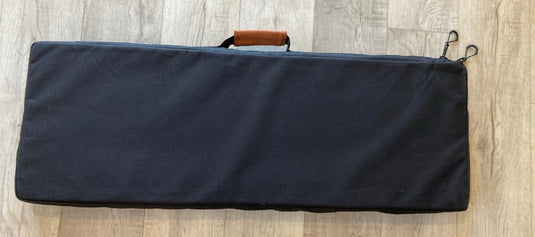 Green Hat Kiteboarding-Takuma Foil Carrying Case-Bottom View on a Wooden Surface