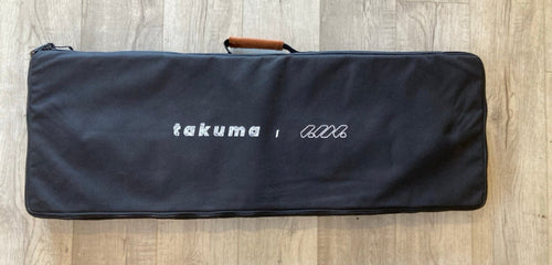 Green Hat Kiteboarding-Takuma Foil Carrying Case-Top View on a Wooden Surface