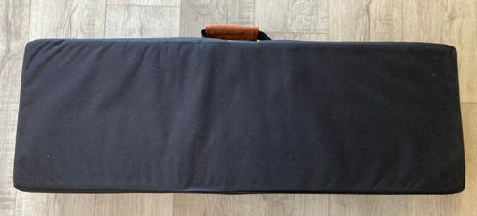 Green Hat Kiteboarding Takuma Mast Carrying Case USED-Bottom View on Wooden Surface