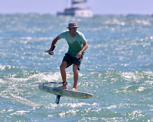 Green Hat Kiteboarding-Unifoil Evolution FW-Action Shot-Man Downwind Foiling