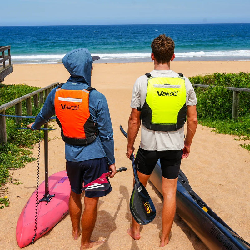 Load image into Gallery viewer, Green Hat Kiteboarding-Vaikobi PFD Orange-Two men wearing the PFD on the Beach
