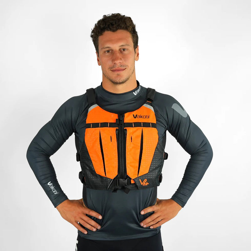 Load image into Gallery viewer, Green Hat Kiteboarding-Vaikobi PFD Orange-Man wearing an orange and black life vest on a white background
