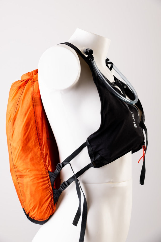 Load image into Gallery viewer, Black hand ornage Ozone Mission Pack on a mannequin against a white background
