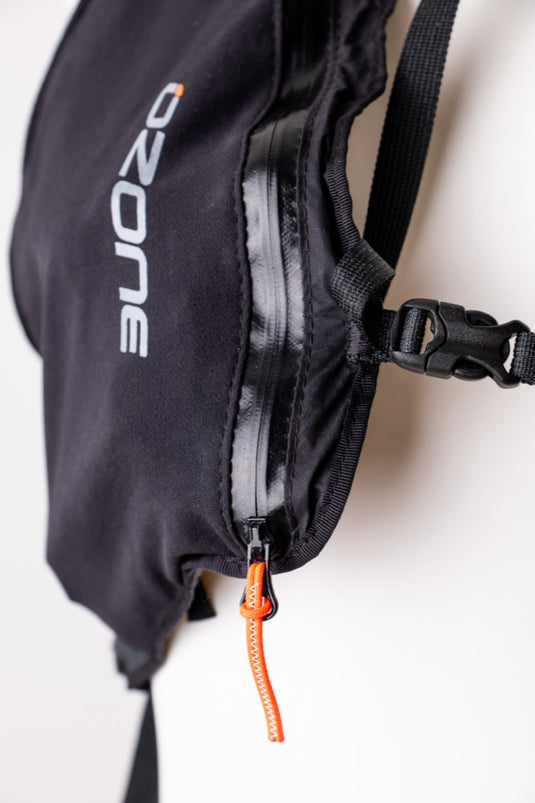 Black hydration vest with 'Ozone' branding on a white background