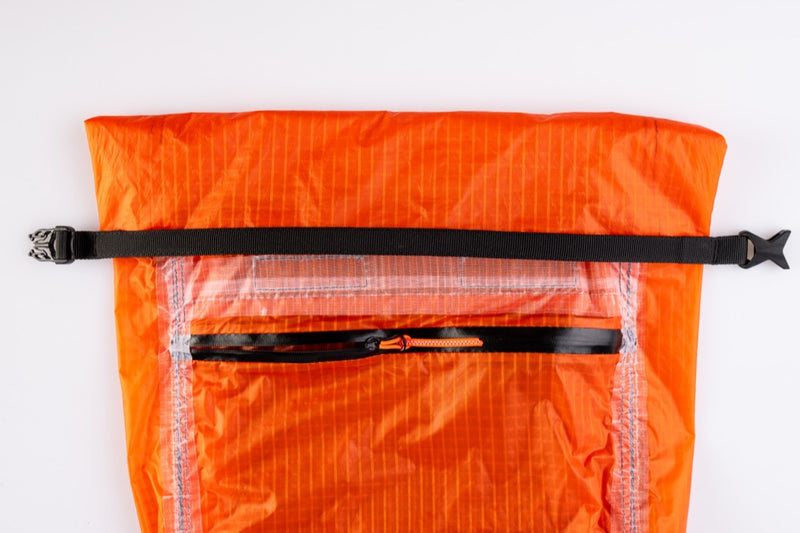 Load image into Gallery viewer, Orange waterproof Ozone Mission Pack with a clear front section on a white background
