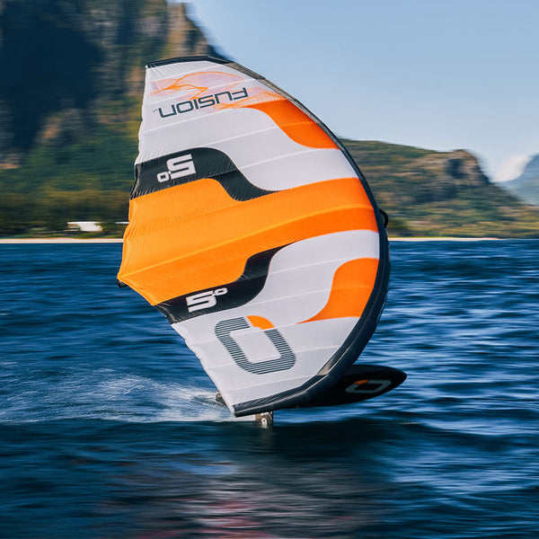 A person sailing on the Ozone Fusion V1 Foil Wing from Green Hat Kiteboarding.