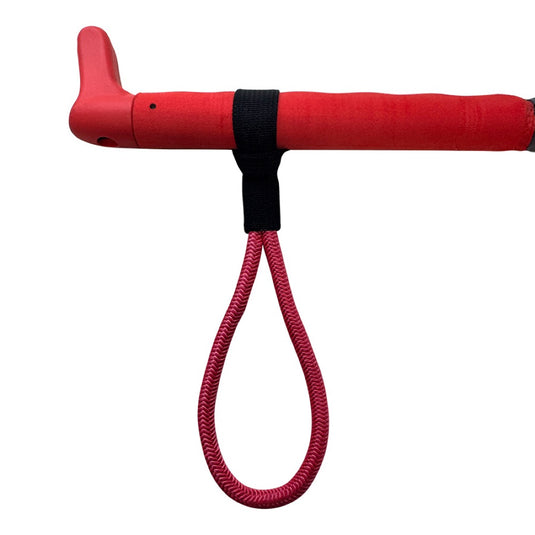 Red handle with a black strap and red harness line on a white background